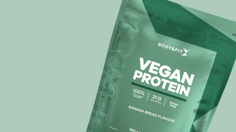 Body&Fit vegan protein banana bread flavour pouch on green background.