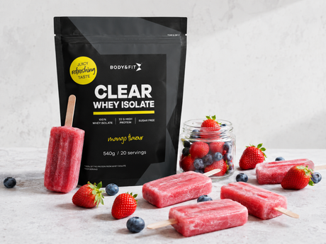 Homemade protein ice lollies made with Clear Whey Isolate, fresh strawberries and blueberries